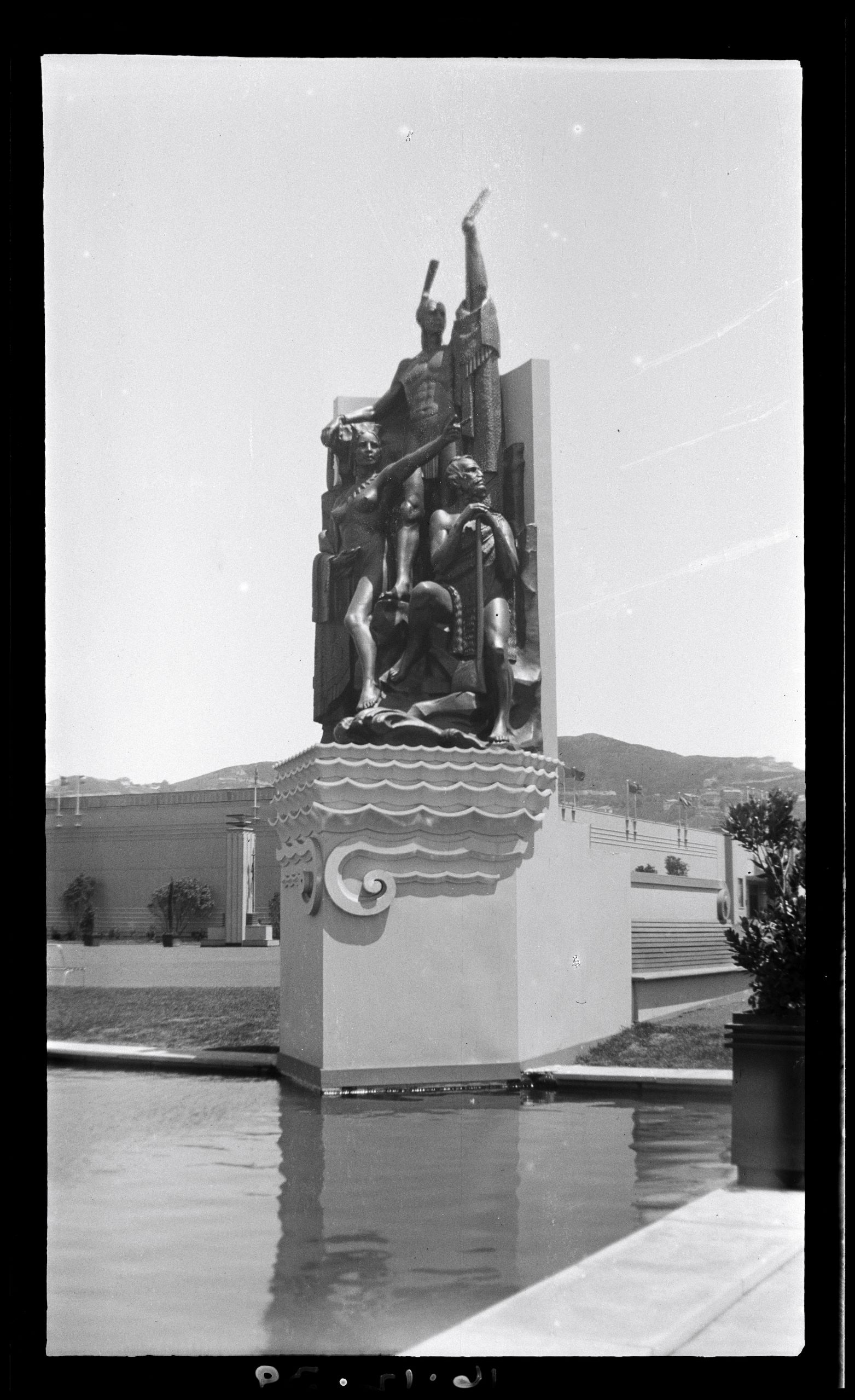 image of a statue of three figures on an ocean going voyage